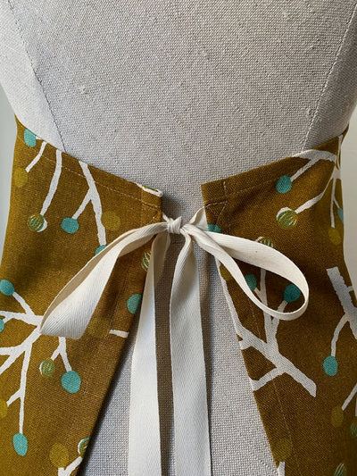 Schürze Zweige – Curry